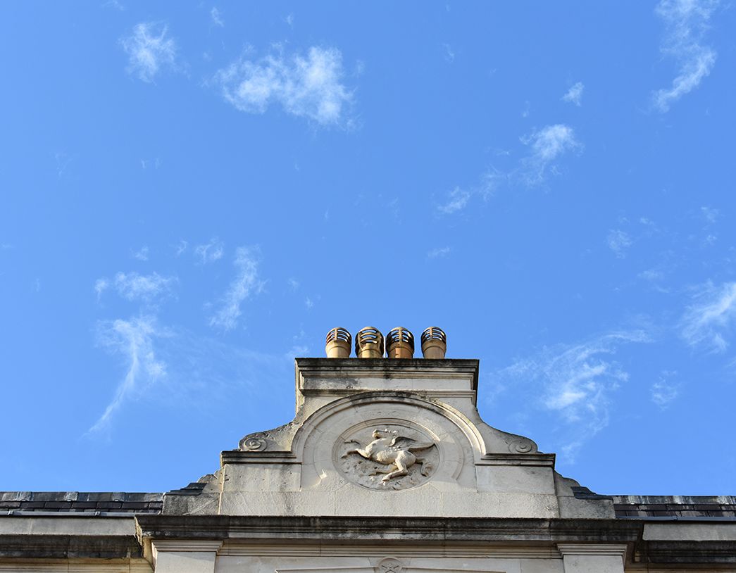 Close up of building architecture outside the Chambers.